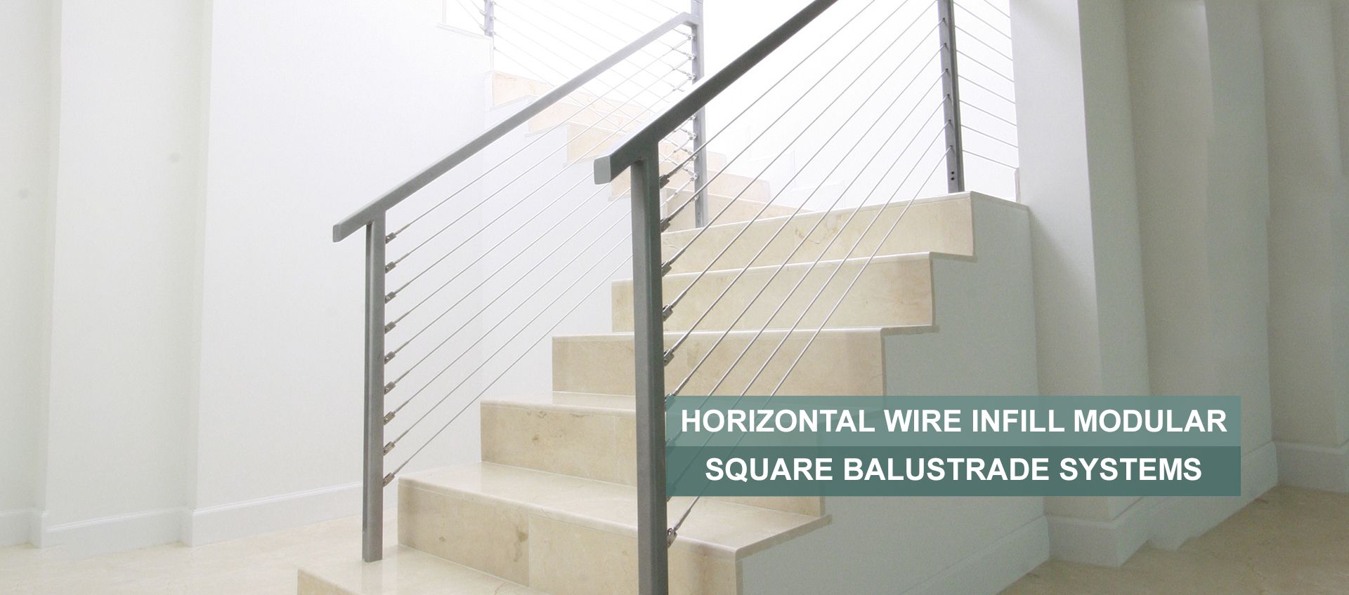 horazontal wire rope infill with square posts going up stairs